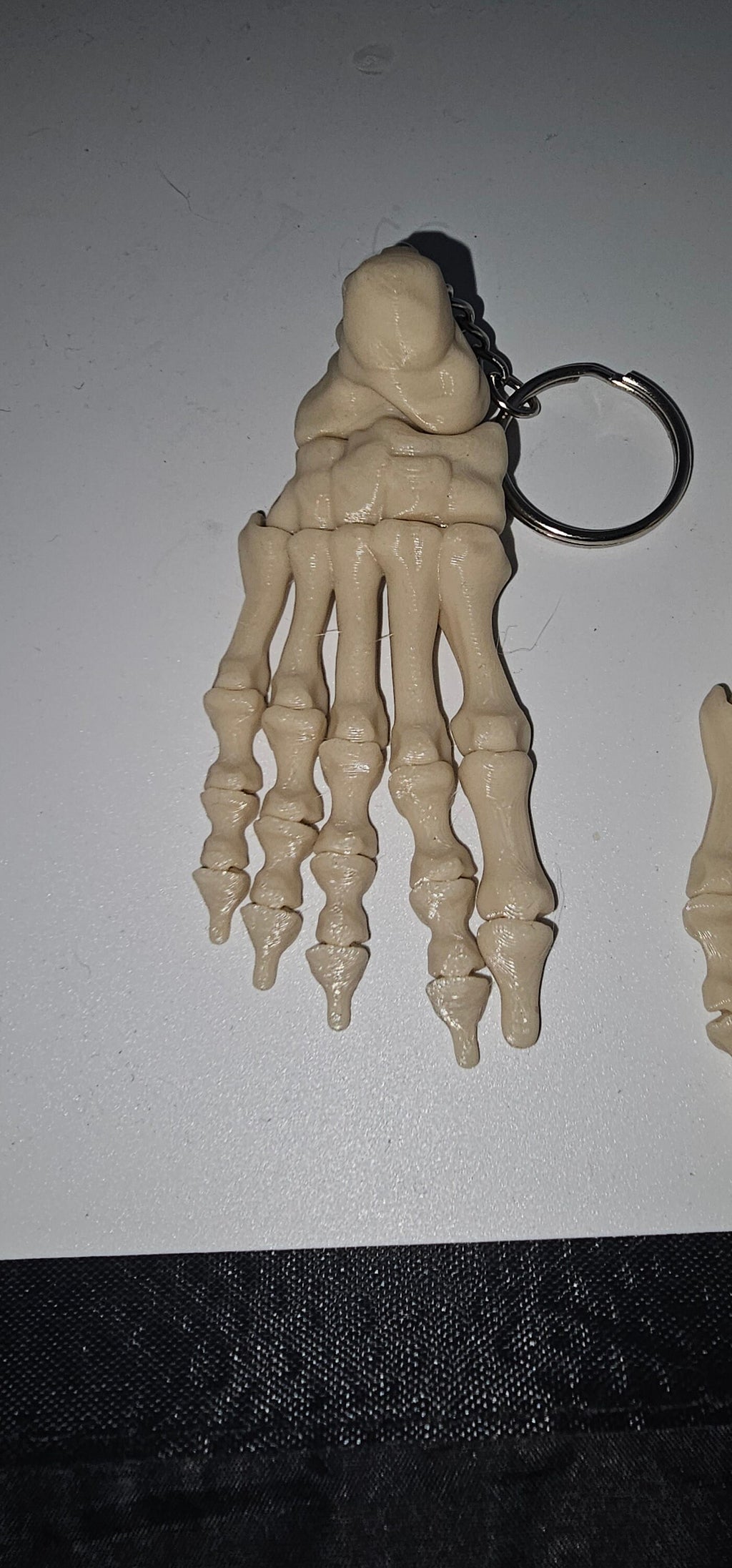 3D printed Small realistic articulated skeleton foot key ring 2 keyrings