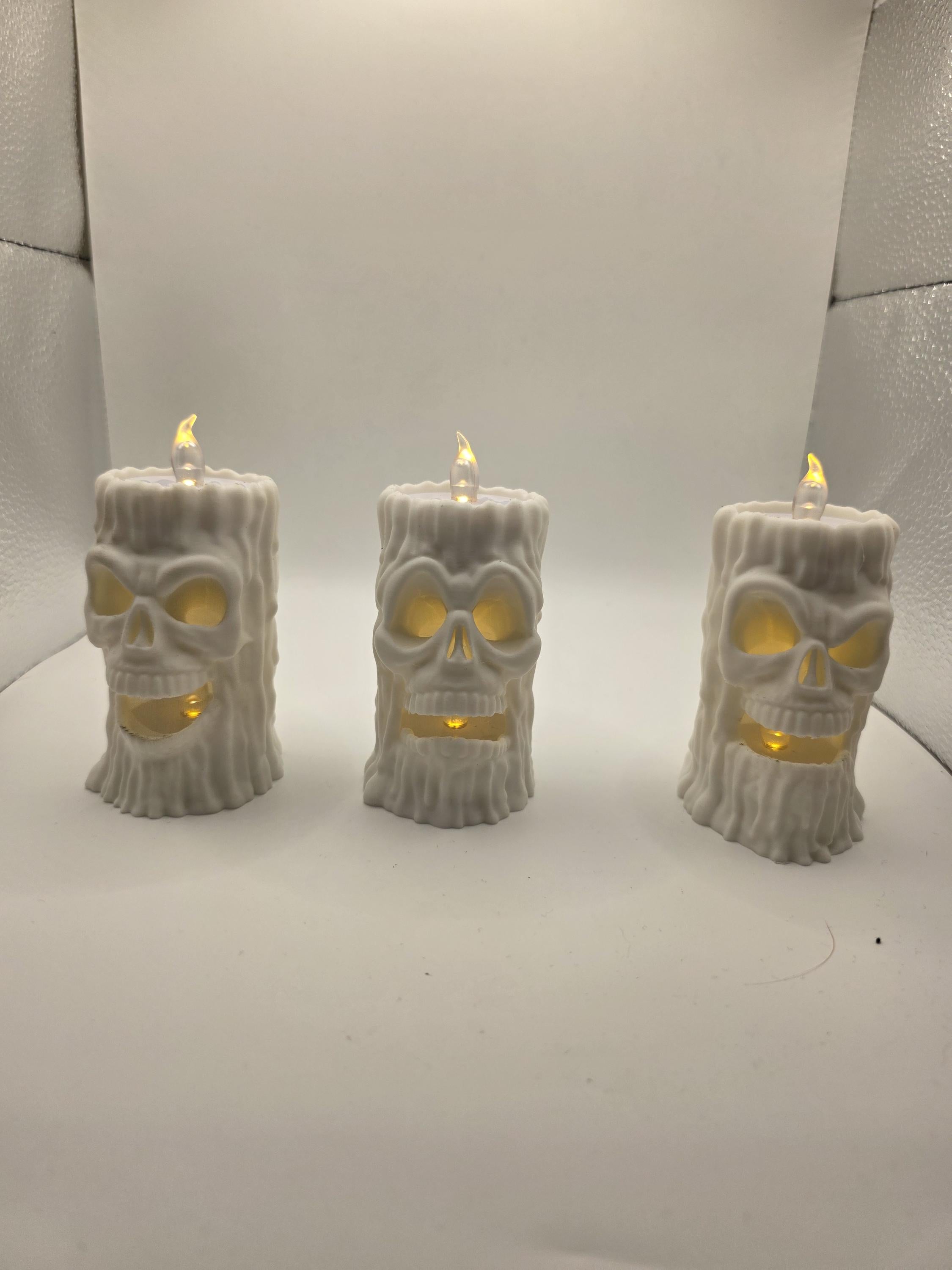 Set of 3 creepy faced candles