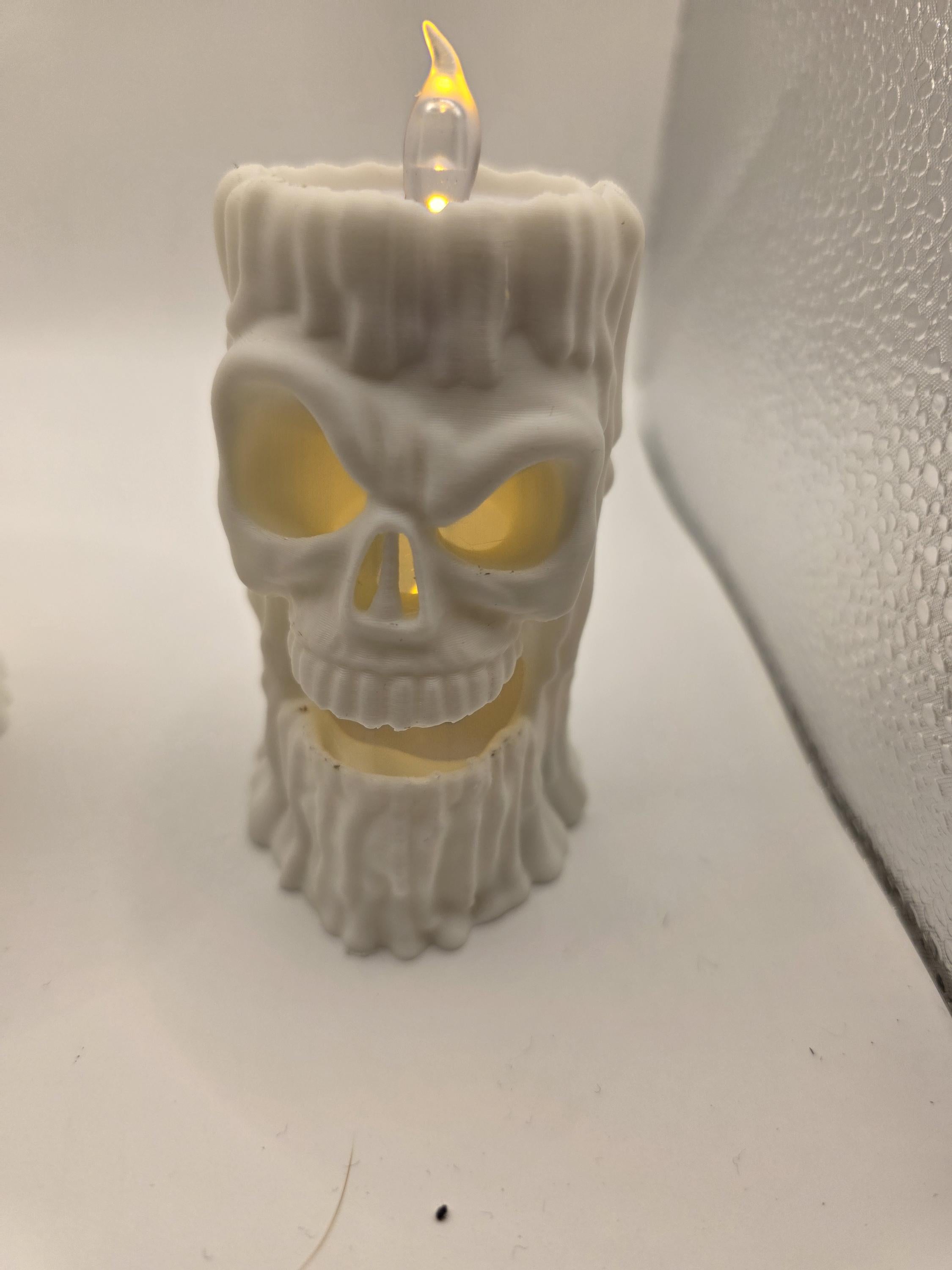 Set of 3 creepy faced candles